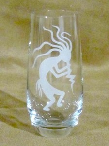 Stemless Champagne Glass with Kokopelli design by AlgriumEngraving