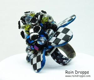 Polymer clay checkered whimsey flower ring by RainDropps